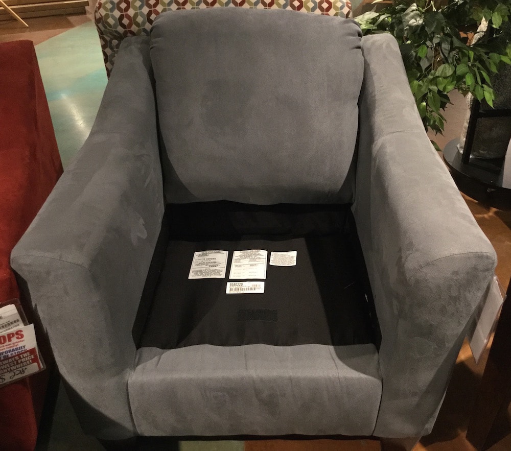 Chair with cushion removed to show cleaning code labels