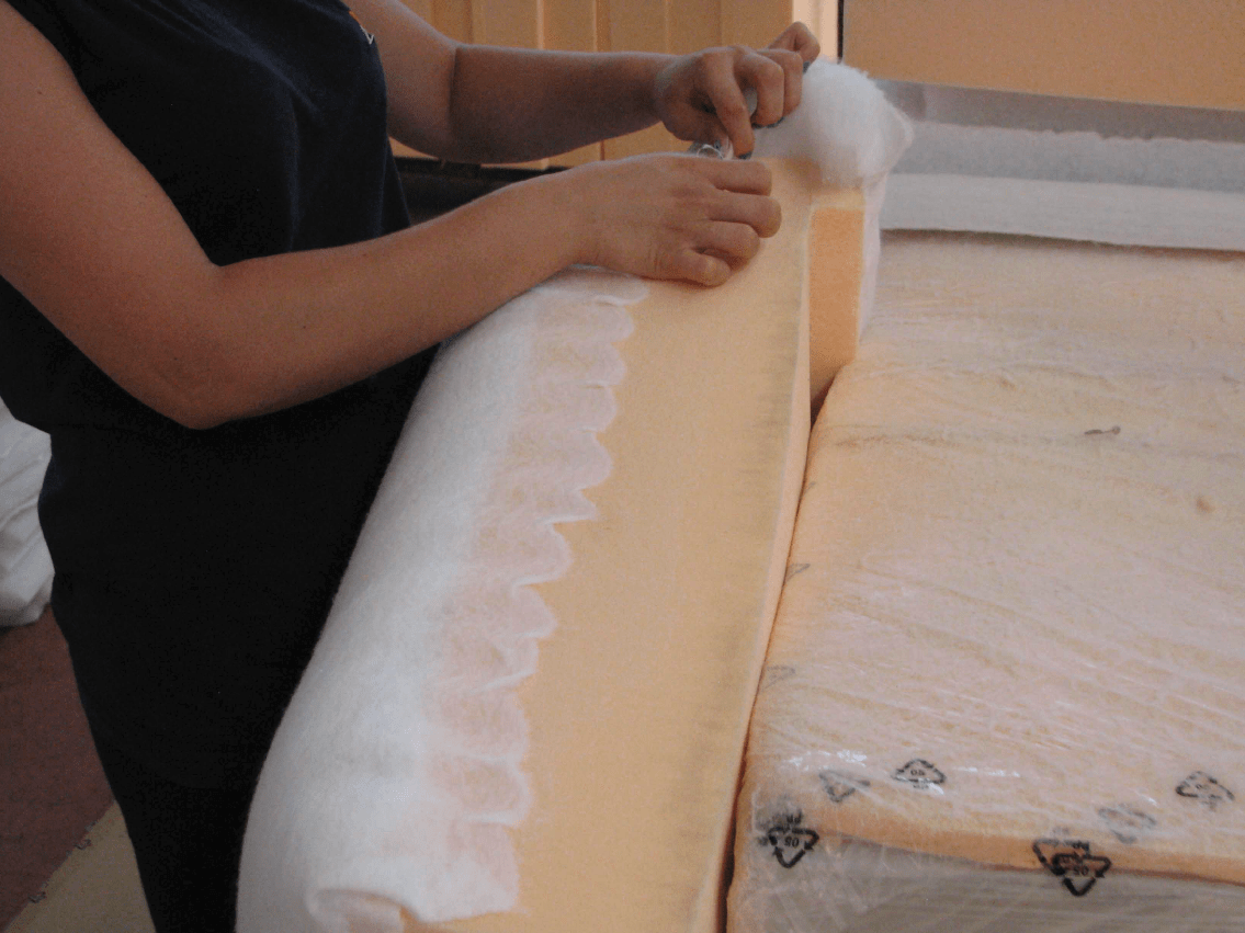Attaching Dacron fiber to foam