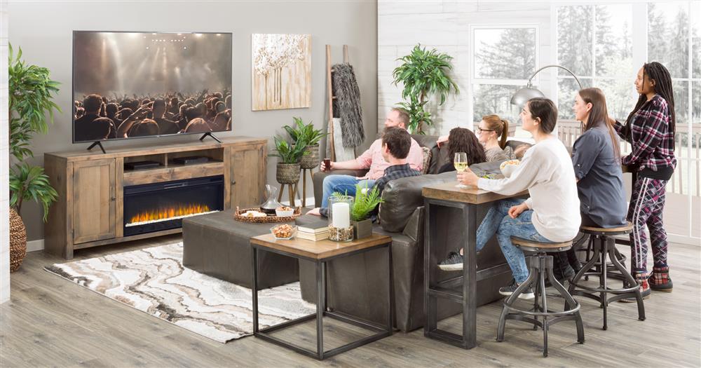 People in living room sitting at a sofa bar table